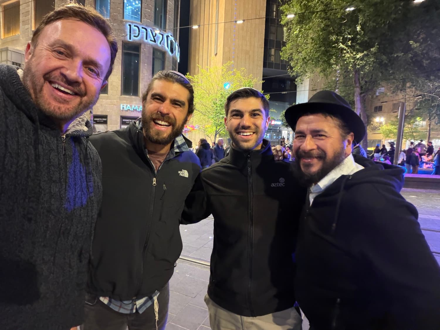 YS Berry with two men during Chanukkah in Jerusalem