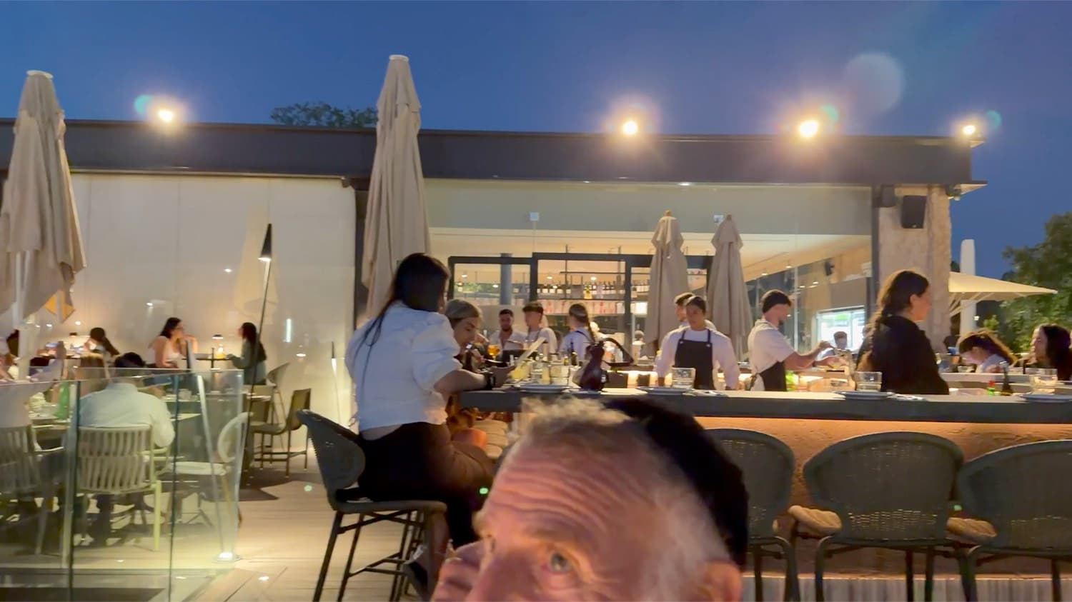 A busy restaurant in the evening near the Knesset in Jerusalem
