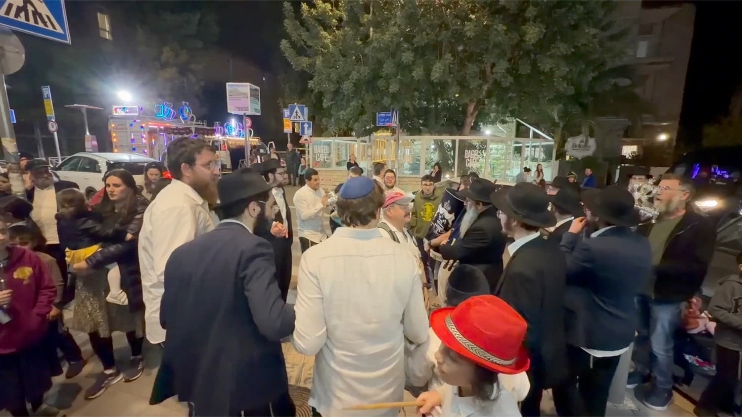 The Torah procession late in the evening